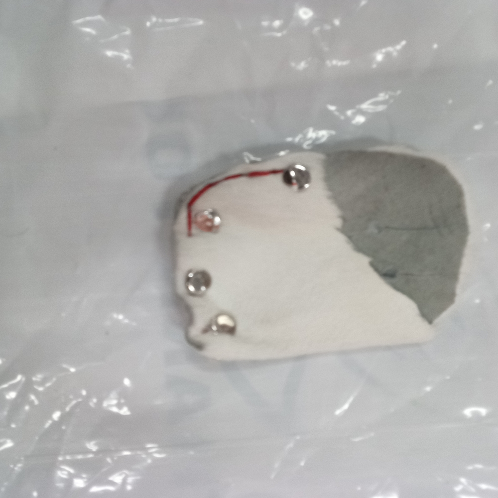 White and Gray Leather Patch with Silver Accents